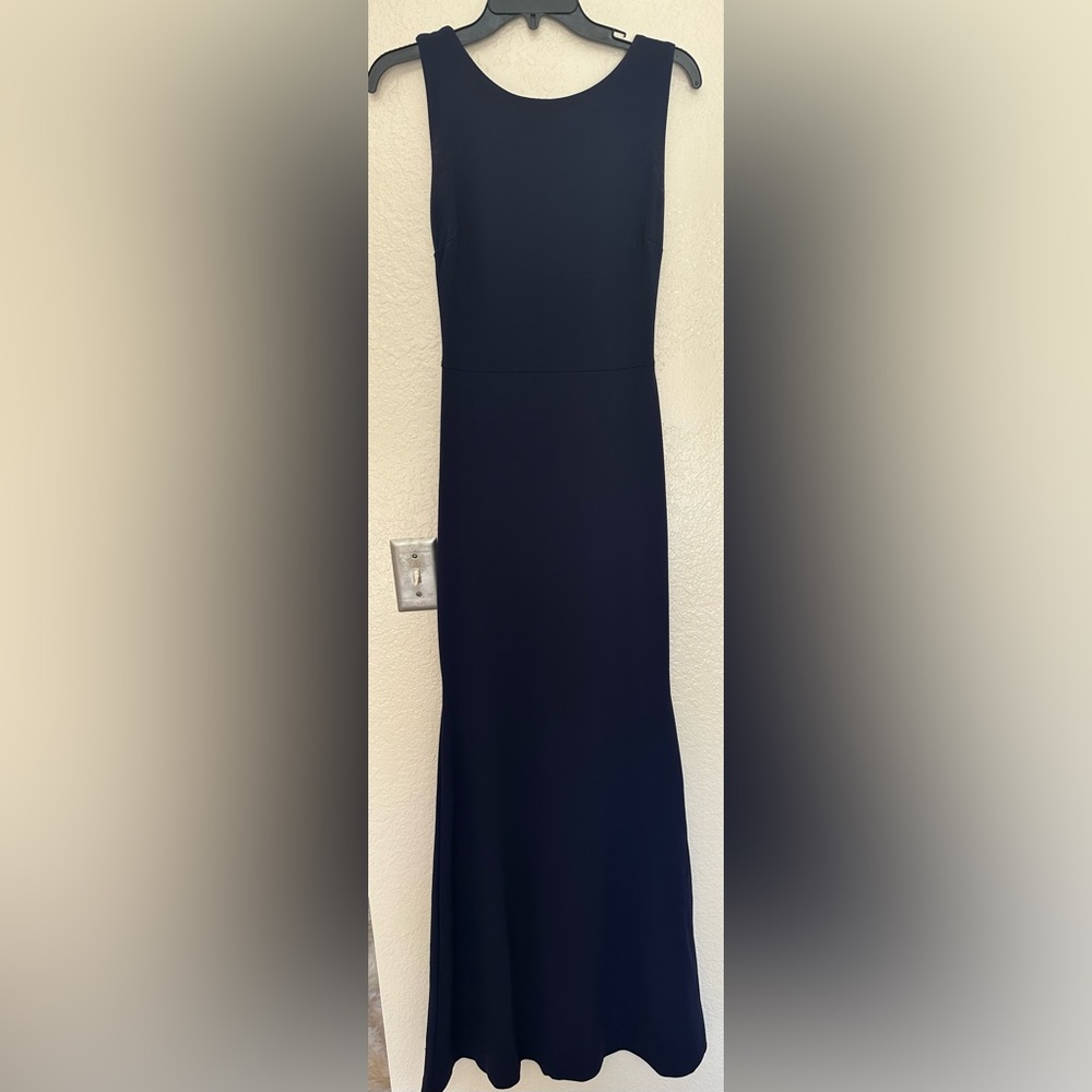 Floor length dark blue prom dress with sheer back